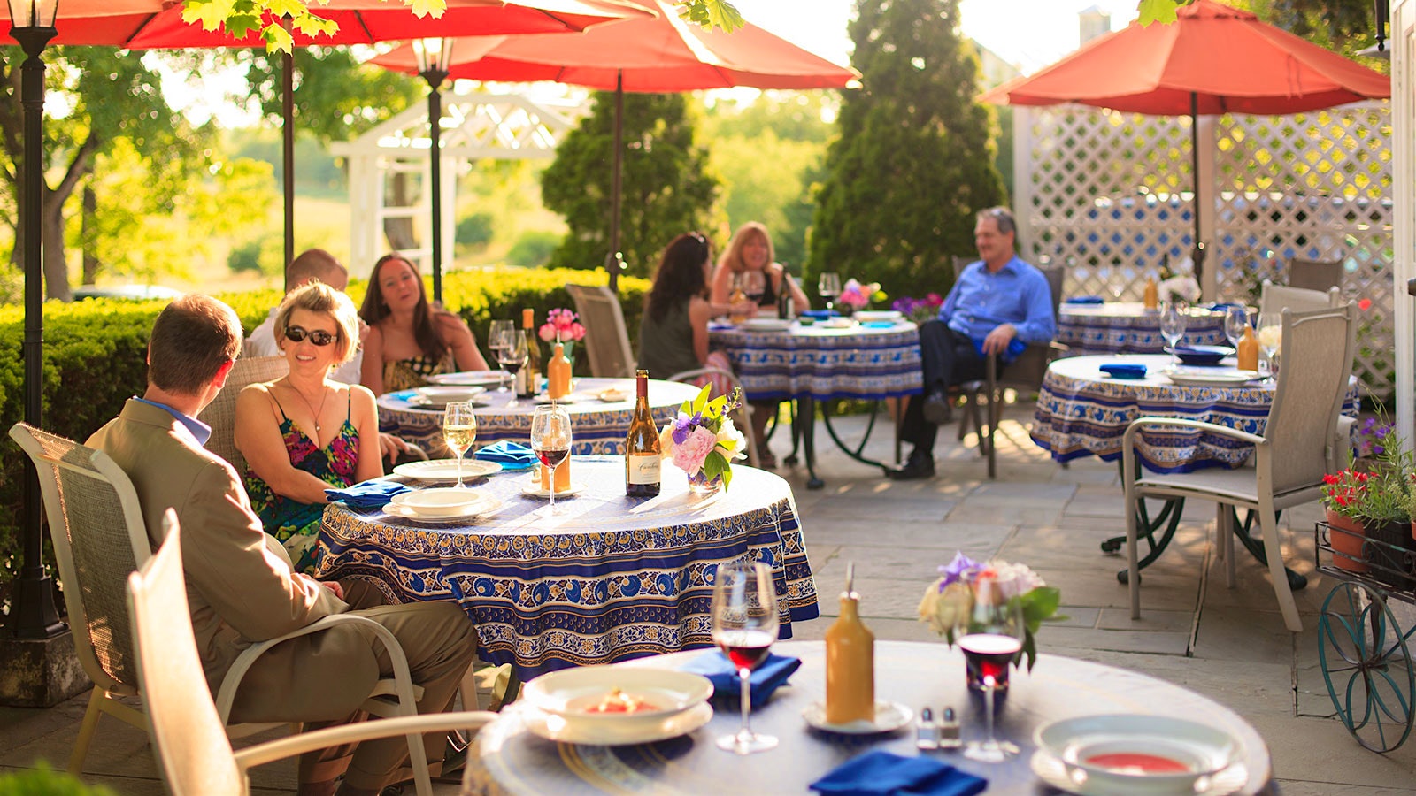 Guests dining outdoors at L’Auberge Provençale